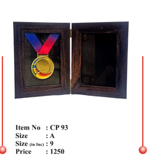 Wooden memento displaying a gold medal; perfect for awards and recognition.