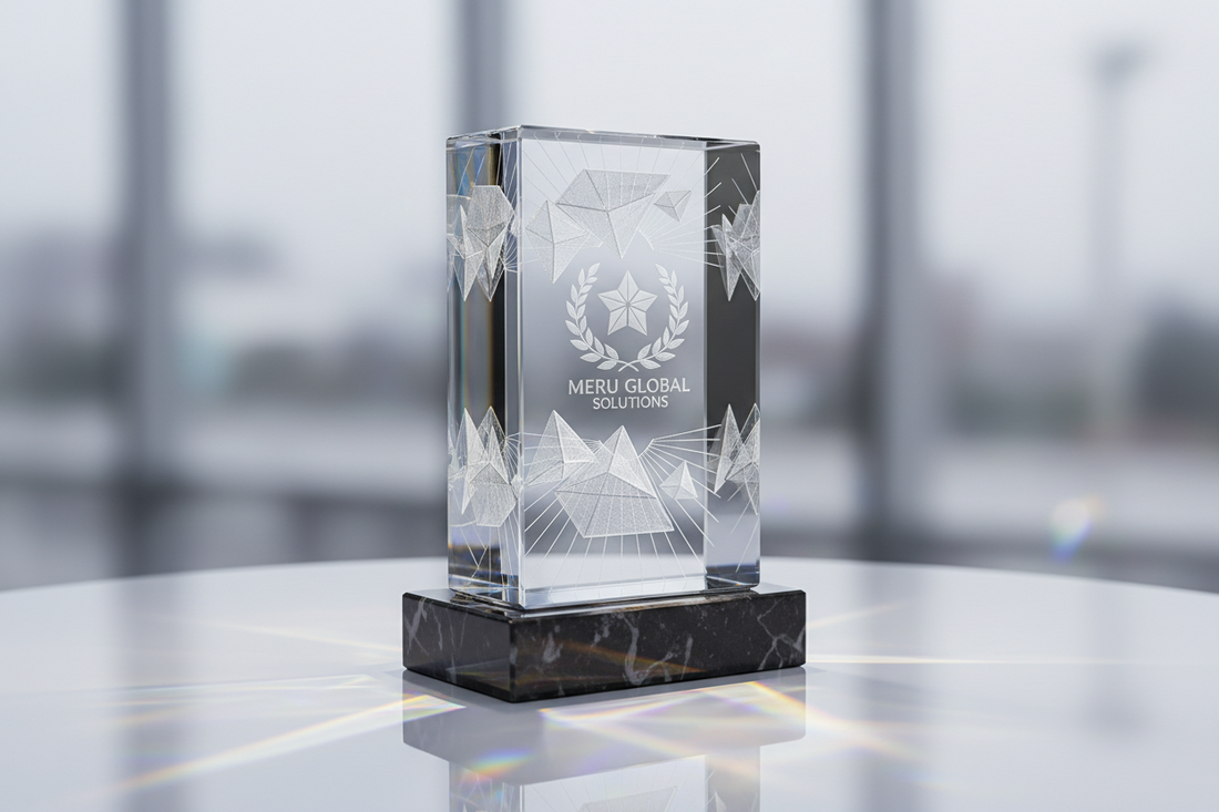 Detailed 3D laser-engraved crystal trophy showcasing a corporate logo; symbolizing excellence and recognition awards for employee achievements and corporate milestones by Meru Trophy.