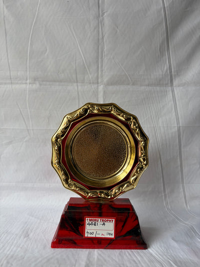Gold trophy with a red base on a white background