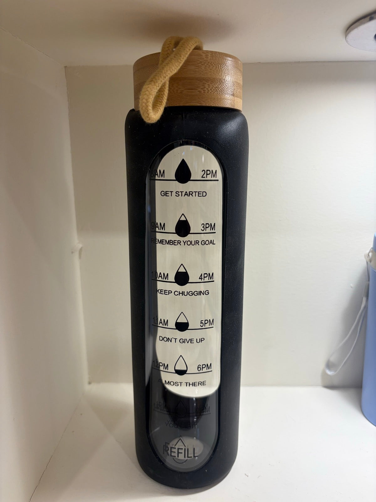 Slim Bottle with Bamboo Lid and Carry Strap - Black - real product photo