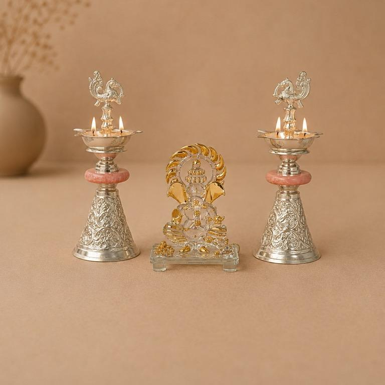 Mangal Ganapatil hamper, handcrafted metal peacock samai lamp and glass Ganesh idol