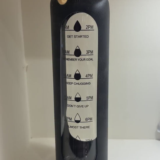 Slim Bottle with Bamboo Lid and Carry Strap - Black - real product video