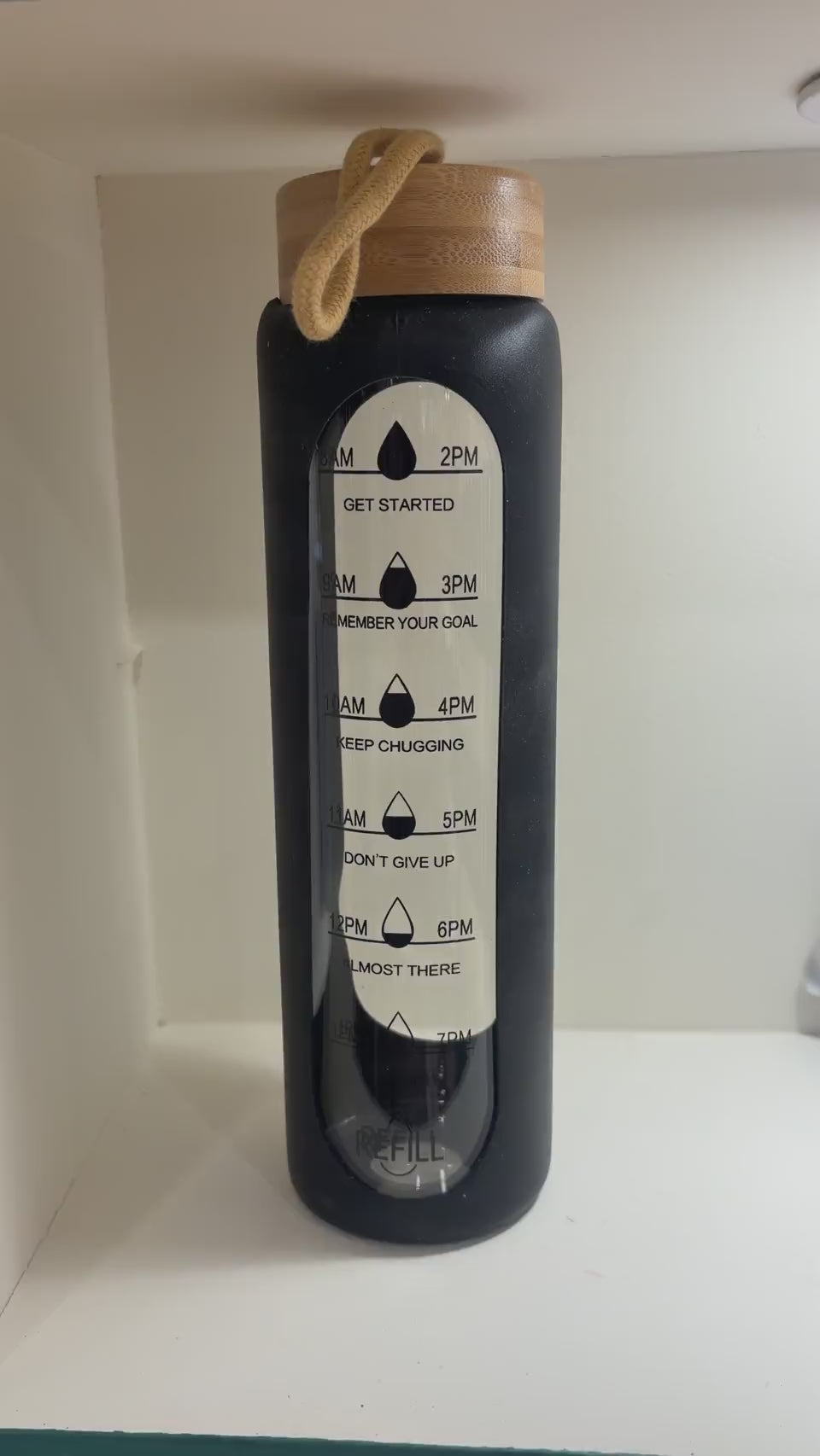 Slim Bottle with Bamboo Lid and Carry Strap - Black - real product video