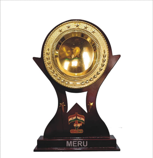 Close-up of a custom wooden memento award trophy with gold accents.